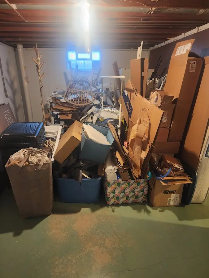 Roll-off dumpster container at job site for Cleanout Dumpster Rental in Anniston